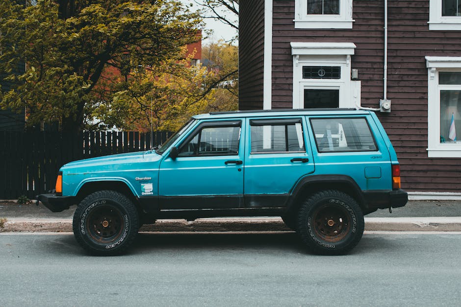 Image of a Jeep Cherokee off-roading in a rugged terrain