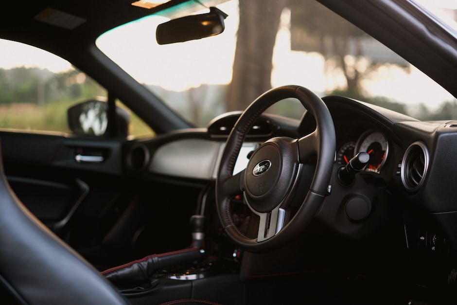 A concerned individual looking at a Subaru Crosstrek's interior, highlighting the potential problems discussed in the text.